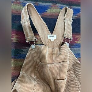 Bibi brand overalls, tan. Tears in knees. Never worn.